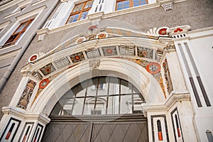 Goerlitz, Saxony, Germany, 04 September 2021: antique renaissance portal, floral ornaments, entrance to house at sunny summer day