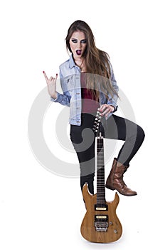 Gogeous blond rocker girl posing holding electric