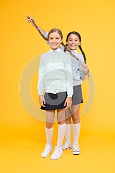 Going crazy. happy girls in school uniform. kid fashion. Friendship and sisterhood. education concept. back to school