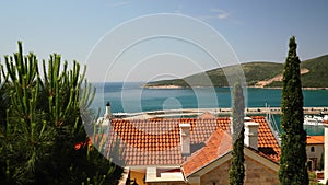 Going Downstairs in Old town with Orange roofs and stone facade in Montenegro on the coast of Kotor Bay of Adriatic sea