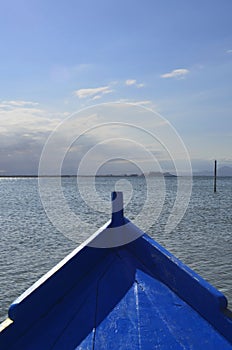 Going fishing with locals on wooden boat in the sea