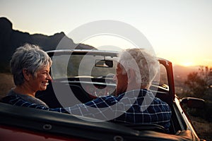 Going on a good old road trip. a senior couple enjoying a road trip.