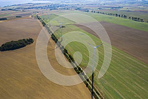 Going green with a wind power from a modern windmill turbine.  Electricity is powered by a mere windy day.  This is a real scene,