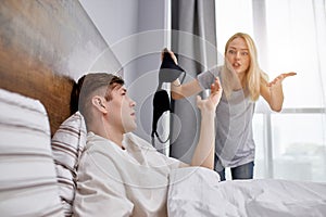 We are going to get divorced disappointed woman and man on bed