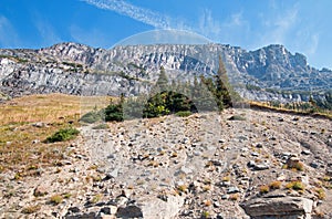 GOING TO THE SUN MOUNTAIN UNDER CIRRUS CLOUDS DURING THE 2017 FALL FIRES IN GLACIER NATIONAL PARK IN MONTANA USA