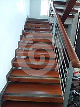 Going up apartment brown wood stairs photo