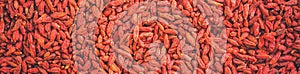 Goji berries on the table closeup. top wiew.