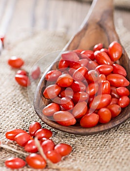 Goji Berries on a wooden spoon