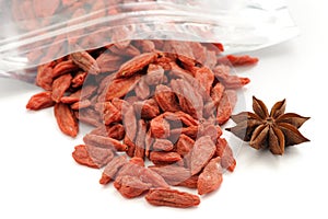 Goji berries in zip lock bag with star anise isolated