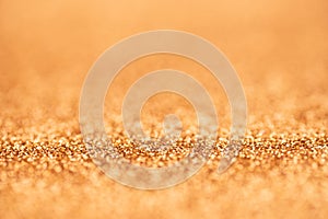 Gold abstract bokeh glitter texture background