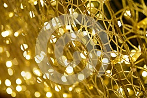 gold abstract light bokeh background in the party and celebration