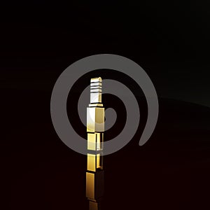 Gold Audio jack icon isolated on brown background. Audio cable for connection sound equipment. Plug wire. Musical