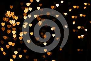 Gold background bokeh lights heart, valentine backgrounds, blurred sparkle for night backdrop