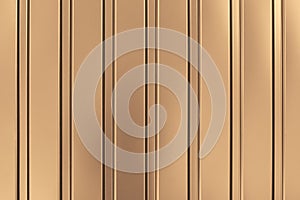 Gold background of metal wall siding, cladding. Fence with shiny, glitter. Reflecting metal convex texture. Light brown metallic s