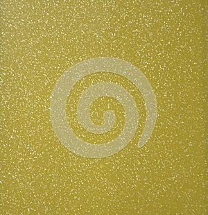 Gold background with silver glitter under the metal. Background, texture. Close-up