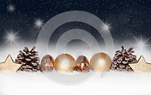 Gold balls, baubles on blue Christmas background
