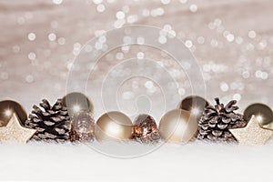 Gold balls on golden lights Christmas background