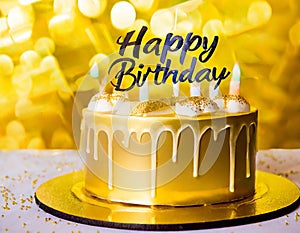 A gold banner with a happy birthday message decorates the birthday cake