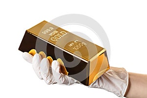 Gold bar in hand