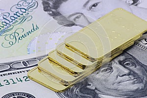 Gold bar ingot close up on the white background ,Gold bar ingot close up on the US money dollar background