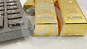 Gold bars with calculator and snowflakes effect