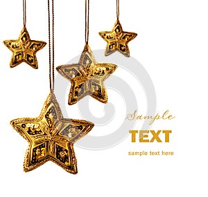 Gold beaded stars isolated on white