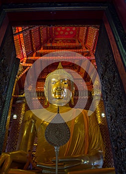 Gold Big Buddha Situated in the Buddhist temple at Wat Phanan Ch