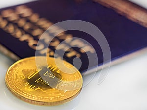 Gold bitcoin, in the background, dollars, decreasing chart, close-up