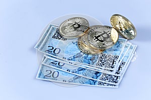 Gold Bitcoin and banknotes