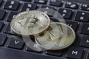 Gold Bitcoin and Etherium Token On Keyboard