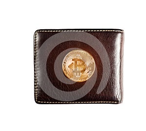 Gold bitcoin on wallet.