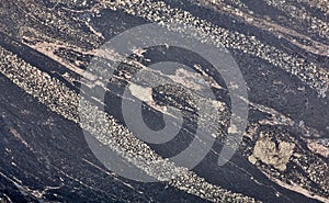 Texture of gold and black nikel ore