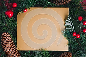 Gold blank greeting card on Green pine christmas wreath with pin