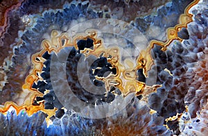 Gold and blue background. abstract natural pattern. stone agate texture background. natural stone ornament close up