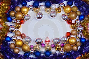 Gold, blue, red and silver glitter Christmas balls pattern. Flat lay, top view, copy space.