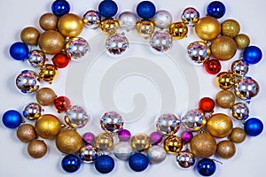 Gold, blue, red and silver glitter Christmas balls pattern. Flat lay, top view, copy space. Christmas golden,red,violet, blue and