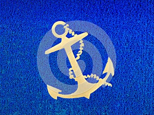 Gold Boat Anchor on Blue
