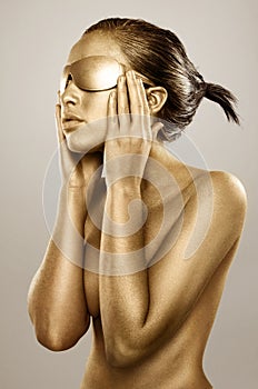 Gold bodypainted girl