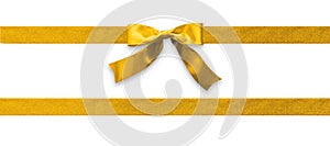 Gold bow ribbon band satin golden stripe fabric isolated on white background with clipping path for Christmas holiday gift box