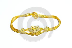 Gold bracelet isolated on white
