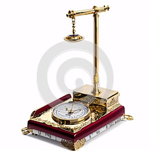 gold brass balance scale isolated on a white background.