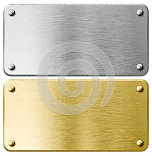 Gold or brass metal plaque with rivets isolated