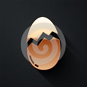 Gold Broken egg icon isolated on black background. Happy Easter. Long shadow style. Vector.