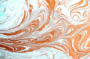 Gold, bronze and blue marbling pattern. Golden marble liquid texture.