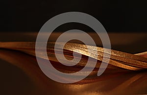 Gold bronze wave on brown. Abstract horizontal luxury backgound