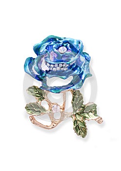 Gold brooch blue rose with diamonds isolated on white