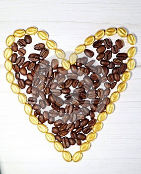 Gold and brown coffee beans heart