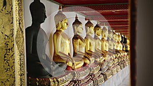 Gold Buddha Statue in Bangkok, Thailand, Lots of Buddhist Statues in a Row at Beautiful Temple for B
