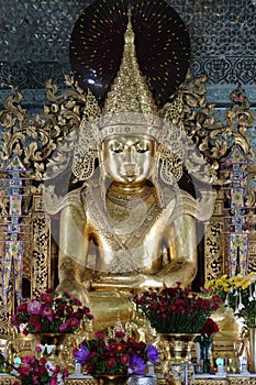 Gold Buddha statue at Sanda Muni Buddhist Temple