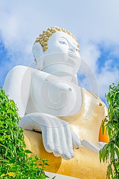 Gold buddha statue in thai temple, Thailand